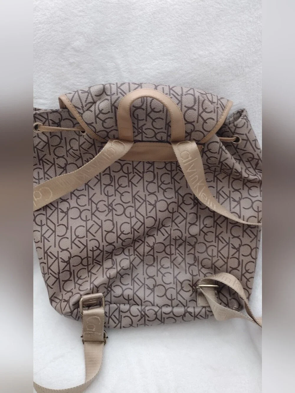 Calvin Klein Monogram Drawstring Backpack in Beige and Brown